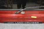 91-97 Toyota Land Cruiser 96-98 LX450 Upper Tail Gate *med Red Pearl 3H4* Dented Used. Price: $765.00.