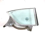 1957 Cadillac 2 Door Driver Side Quarter Glass Window Chrome Trim Used. Price: $75.00.