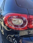 2009-2011 Volkswagen Tiguan Driver Side Tail Light (qtr Panel Mtd) Used. Price: $60.00.