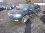 Passenger Right Front Door Glass Excluding Solar Fits 01-03 Caravan 32026125 Used. Price: $143.00.