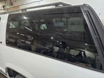 Used Left Quarter Glass Fits: 1997 Gmc Suburban 1500 W/privacy Tint Grade. Price: $549.00.