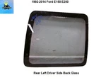 XC2Z1542006AB 92 To 14 Ford E150 E250 Left Rear Back Barn Door Window Glass Used. Price: $129.00.
