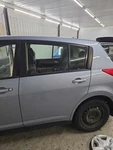 Used Rear Left Door Assembly Side Fits: 2012 Nissan Versa Htbk Electric. Price: $700.90.