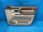 Oem Lexus LX470 Front Passenger's Door Interior Trim Panel TAN:LF40 1998-2002 Used. Price: $295.00.
