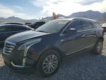 Left Blue Front Door Assembly Oem 17-24 Cadillac XT5 Used. Price: $1100.00.