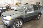 Tailgate / Trunk Decklid For Mazda Tribute Assy Grn Heat Priv Wipe Spoiler Used. Price: $149.99.
